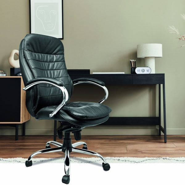black leather executive office chair in room shot in front of office desk