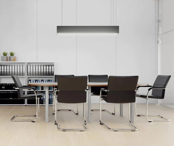 black leather meeting chair around meeting table with office bookcase