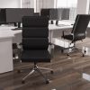 black leather office chair with chrome base and arms in room set in front of office desks