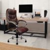 brown leather executive office chair with chrome base. Room shot in front of office desk