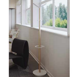 coat stand light wood with white hooks and base in office room shot