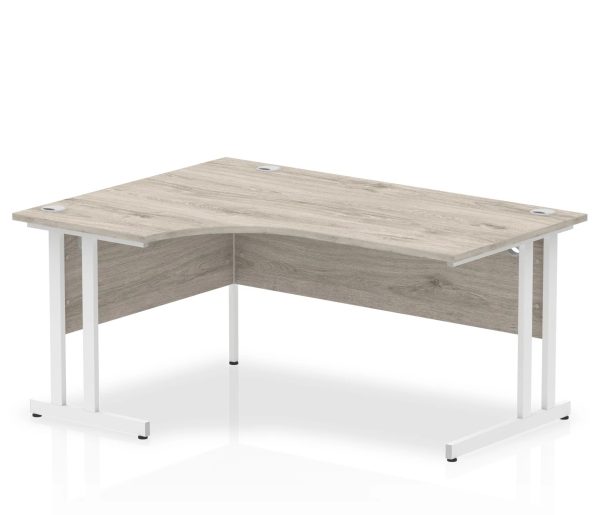 crescent desk with grey oak desk top and white cantilever leg frame