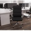 crescent office desk in white with black leather office chair