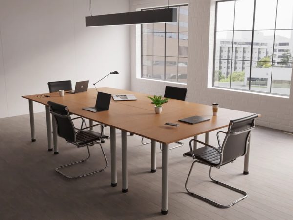 design classic meeting chair in black leather with chrome cantilever leg frame. In room setting around rectangular meeting table