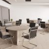 contemporary visitor chairs in meeting room room set around round meeting tables