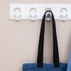 designer coat hooks white wall mounted close up