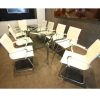 glass meeting table with chrome frame in meeting room with cream meeting room chairs