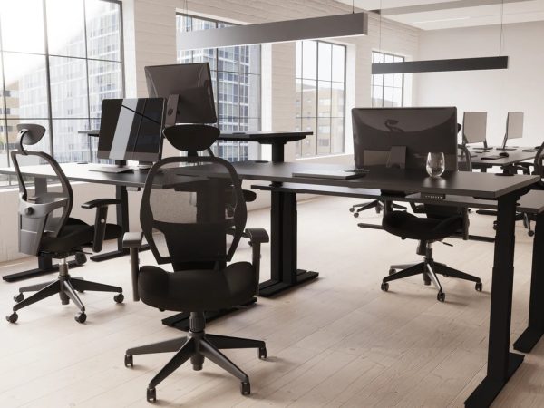 height adjustable desk black in office roomshot