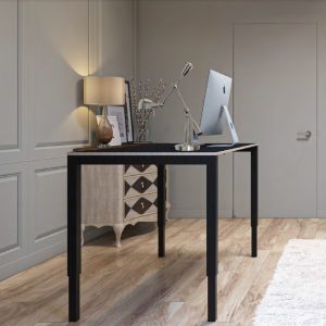 height adjustable desk with black frame in roomshot.