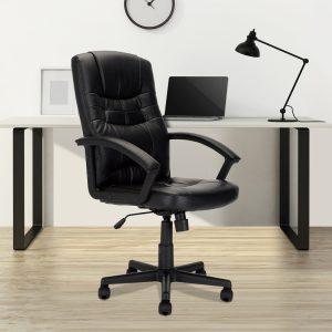 high back black leather effect office chair in room set in front of office desk