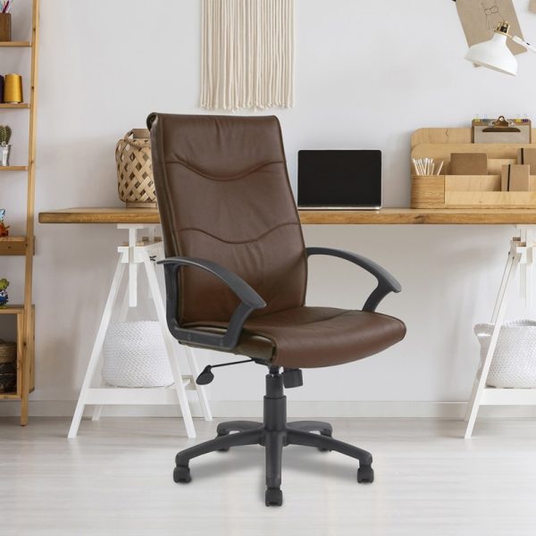 high back leather faced executive office chair brown leather. in room shot with trestle style office desk