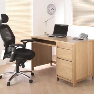 Stylish mesh back office chair room shot in front of home office desk