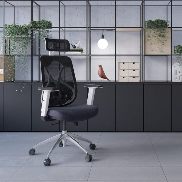 mesh back office chair black with white frame in office room shot in front of black office shelving