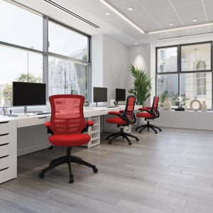 designer mesh back office chair red in room shot with white desks and city view