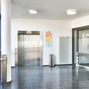 no touch office bin in reception by lift doors