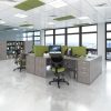 ergonomic office desk with panel end in grey oak. room set with lime green office screens and chairs