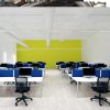 office desk screens on rows of office desks in modern office