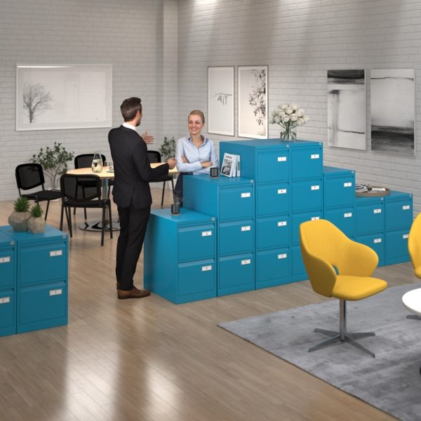 office filing cabinets blue in room shot with office desks and meeting chairs