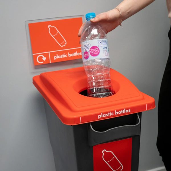 office recycling bin lid for bottles with someone placing a plastic bottle in the bin