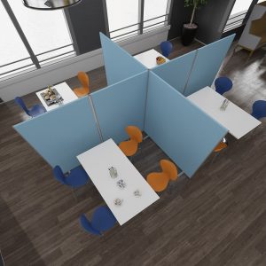 ariel shot of office with blue fabric screens around white office desks