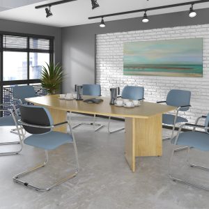 radial boardroom table in beech in boardroom setting with blue meeting chairs