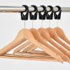 wooden captive hangers on coat rail