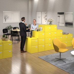 yellow office filing cabinets in room sot with office desks and people talking and meeting chairs