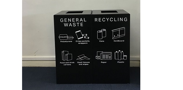 2 black office recycling bins