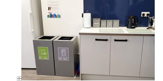 2 silver office recycling bins in office kitchen