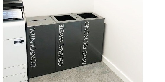 row of 3 grey office recycling bins with white lettering Confidential, General Waste and Mixed Recycling