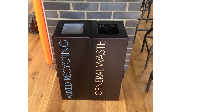 2 black square office recycling bins