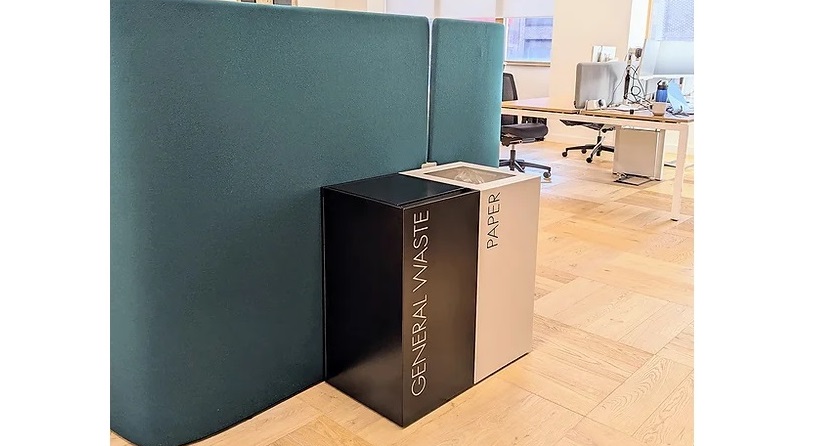 office recycling bins in black and white in office setting. Ideal for new waste management rules