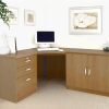 home office corner desk in oak with pedestal drawer unit and office cupboard