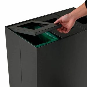 office recycling bin close up of someone lifting the hinged lid