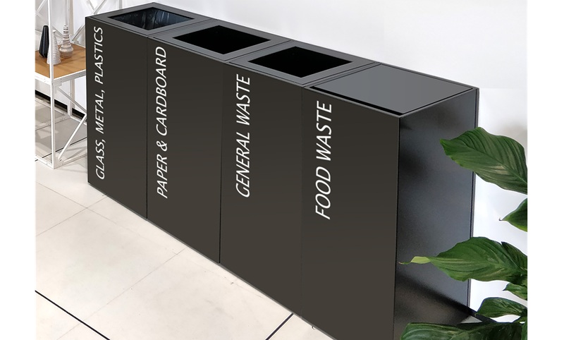 office recycling bin for food waste, mixed recycling and general waste in row of four black