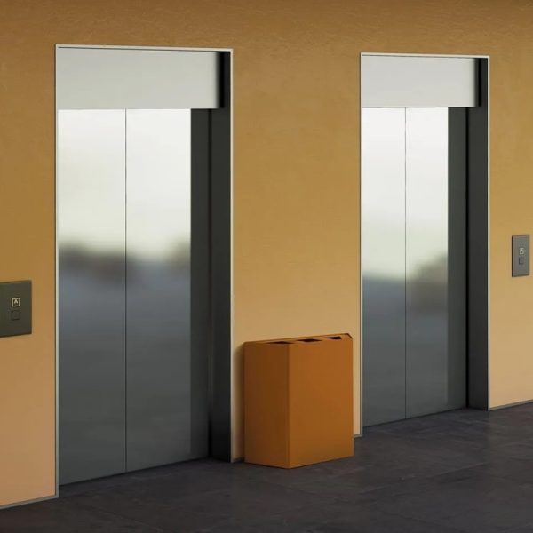 office recycling bin with three sections in front of lifts