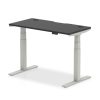 height adjustable desk with black desk top and silver legs