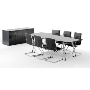 black board room cupboard and large board room table surrounded by meeting chairs