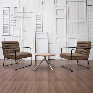 brown leather reception chair lounge chairs with black frame around a coffee table