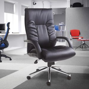 executive office chair with deep padded seat and back in black faux leather in office room shot