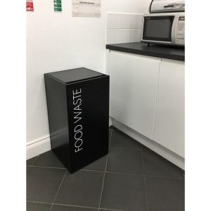 food waste black office recycling bin with soft close top in a kitchen. white Food Waste lettering