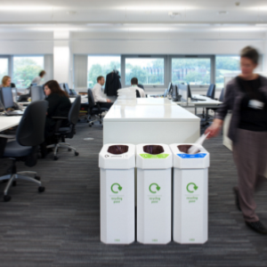 office roomset with 3 cardboard office recycling bins at end of office storage