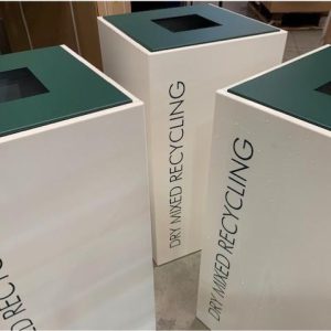 white office recycling bin with green top and lettering Dry Mixed Recycling