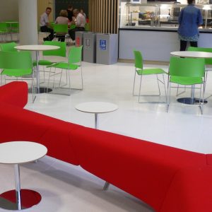 cafe area with 3 silver office recycling bins