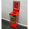 transparent office recycling bin with red top and base and Plastic Bottle signage