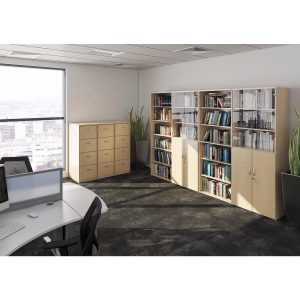 Office room shot with office bookcases, Office cupboards and filing cabinets in light wood with white desk and black office chair